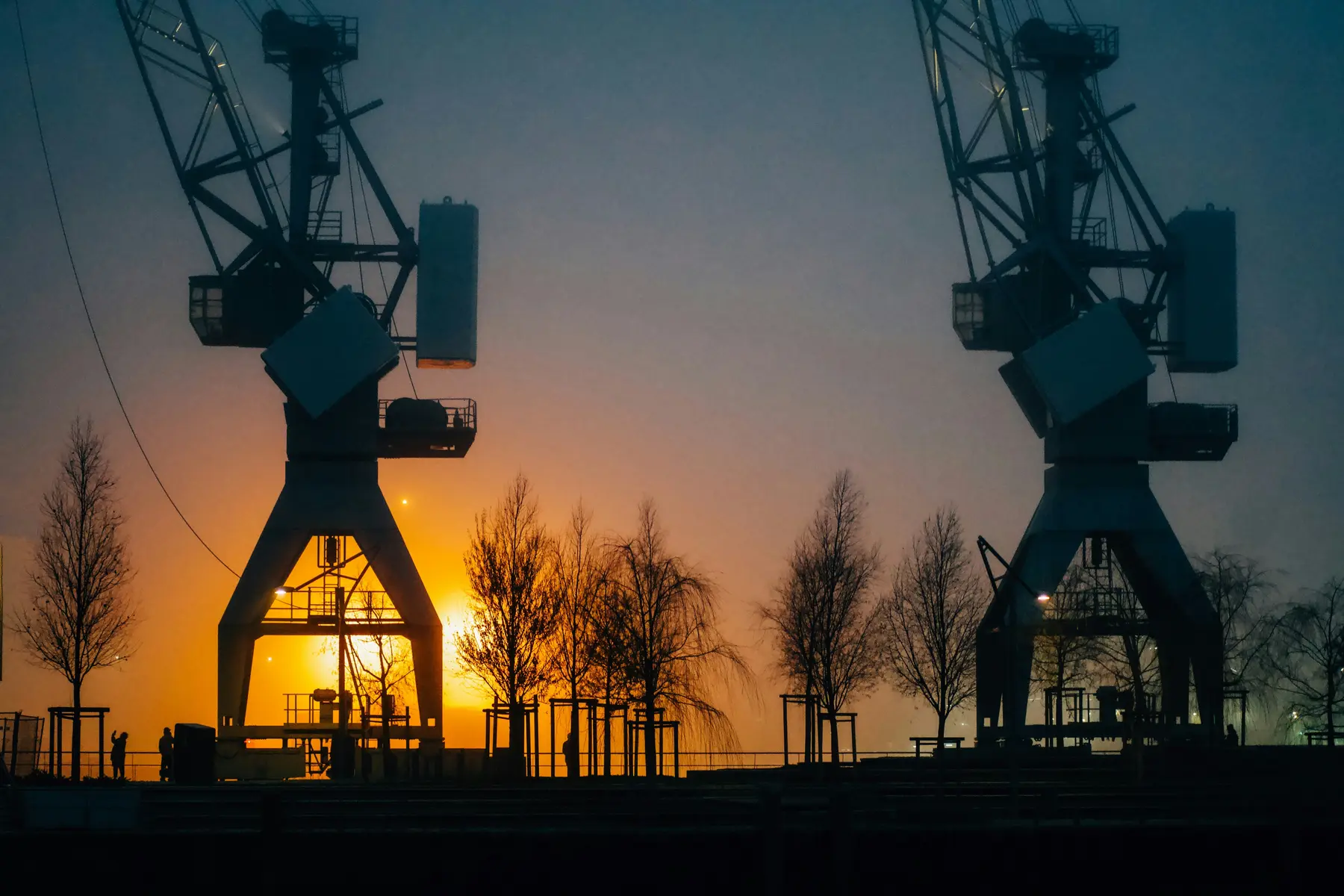 Industrial facility and port at dawn